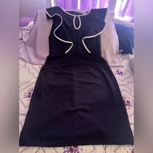 Elegant Black Dress with White Trim